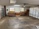 Spacious garage with multiple workbenches and pegboard at 211 55Th Nw St, Bradenton, FL 34209