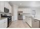 Beautiful kitchen features modern appliances and a large center island at 2316 Springhaven Ln, Lakewood Ranch, FL 34211