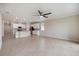 Spacious open-concept layout, seamlessly connecting the living room and kitchen area at 2316 Springhaven Ln, Lakewood Ranch, FL 34211
