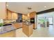 Well-equipped kitchen with modern appliances, custom cabinetry, and a functional center island at 2321 Milford Cir, Sarasota, FL 34239