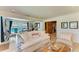 Comfortable and inviting living area flows seamlessly into dining room and outdoor space at 2321 Milford Cir, Sarasota, FL 34239
