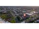 Aerial view of condo community close to local businesses, major roads, and mature landscaping at 2395 Harbor Blvd # 314, Port Charlotte, FL 33952