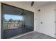 Balcony with sliding glass doors and a ceiling fan overlooking the beautiful exterior at 2395 Harbor Blvd # 314, Port Charlotte, FL 33952