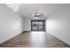Spacious living room with sleek wood floors and modern lighting fixtures, bright and welcoming at 2395 Harbor Blvd # 314, Port Charlotte, FL 33952