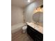 Modern bathroom with updated vanity, fixtures, and shower-tub combination at 2613 Pine Lake Ter # C, Sarasota, FL 34237