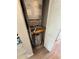 Utility closet with a water heater and HVAC system at 2613 Pine Lake Ter # C, Sarasota, FL 34237