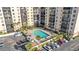 An aerial view of a condo building shows the swimming pool and parking at 2901 26Th W St # 204, Bradenton, FL 34205
