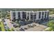 An aerial shot of the condo complex, parking area, and tropical surroundings at 2901 26Th W St # 204, Bradenton, FL 34205