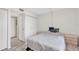 This cozy bedroom features wood-look floors and a closet with shutter doors at 2901 26Th W St # 204, Bradenton, FL 34205