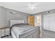 Comfortable bedroom featuring neutral walls, light wood floors, and ample closet space at 2901 26Th W St # 204, Bradenton, FL 34205