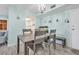 Dining room with seating for four with a view into the kitchen at 2901 26Th W St # 204, Bradenton, FL 34205