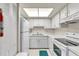 Efficient kitchen with white appliances and ample counter space at 2901 26Th W St # 204, Bradenton, FL 34205