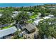 Aerial view of a single Gathering home with a fenced-in backyard near the water at 3307 Miami Pl, Bradenton, FL 34207