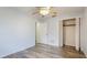 This bedroom features wood-look floors and a ceiling fan at 3525 Riviera Dr, Sarasota, FL 34232