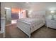 Bedroom with a door to a patio, offering a private outdoor retreat at 3615 Puerta Ct # 8516, Sarasota, FL 34232