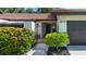 Close up of the front gate and garden, showing the landscaped entrance to the home at 3615 Puerta Ct # 8516, Sarasota, FL 34232