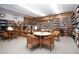 Cozy library space with bookshelves, reading tables, and comfortable seating for quiet enjoyment at 3615 Puerta Ct # 8516, Sarasota, FL 34232