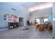 Bright community lounge featuring high ceilings, comfortable seating, and a bulletin board at 3615 Puerta Ct # 8516, Sarasota, FL 34232