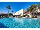 Relaxing community pool with lounge chairs and shady umbrellas, perfect for sunny days at 3615 Puerta Ct # 8516, Sarasota, FL 34232