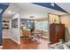 Inviting dining room featuring hardwood floors, stylish furniture, and natural light creating a warm atmosphere at 3636 Torrey Pines Blvd, Sarasota, FL 34238