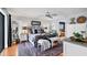 Spacious main bedroom featuring a light gray color scheme, ceiling fan, and ensuite bathroom entrance at 3636 Torrey Pines Blvd, Sarasota, FL 34238