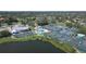 Overhead view showcasing multiple tennis courts and the sports complex, providing a hub for community activities at 3636 Torrey Pines Blvd, Sarasota, FL 34238