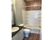 Well-lit bathroom with combined tub and shower, vanity with sink, and neutral finishes at 4802 51St W St # 1313, Bradenton, FL 34210