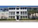 Beautiful condo complex featuring multiple screened lanais and well-maintained landscaping at 4802 51St W St # 1313, Bradenton, FL 34210