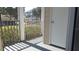 Screened porch provides a view of the community and nearby parking at 4802 51St W St # 1313, Bradenton, FL 34210