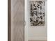 Hallway with a view of a custom-designed barn door at 522 31St W St, Bradenton, FL 34205
