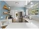 Updated kitchen features stainless steel appliances, bright countertops, and natural light at 522 31St W St, Bradenton, FL 34205
