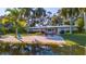 Charming Florida home with a private sandy beach area, perfect for relaxing by the water at 5311 36Th E Ave, Palmetto, FL 34221