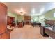 Spacious Gathering room featuring a brick fireplace and multiple desks and office spaces at 5311 36Th E Ave, Palmetto, FL 34221
