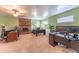 Large Gathering room with a brick fireplace and built-in desks at 5311 36Th E Ave, Palmetto, FL 34221