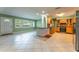 Spacious open kitchen featuring tile flooring, and a kitchen island with seating at 5311 36Th E Ave, Palmetto, FL 34221