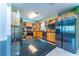 Updated kitchen with wood cabinets, stainless steel appliances, and stylish backsplash at 5311 36Th E Ave, Palmetto, FL 34221
