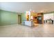 Spacious living room with updated kitchen and breakfast bar seating at 5311 36Th E Ave, Palmetto, FL 34221