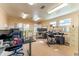 Well-lit office space equipped with several workstations, filing cabinets, and ample desk space at 5311 36Th E Ave, Palmetto, FL 34221