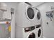 Laundry area with stacked washer and dryer at 538 Canal Rd, Sarasota, FL 34242