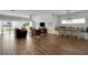 Open-concept living area featuring ample seating and large windows at 538 Canal Rd, Sarasota, FL 34242