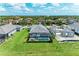 Panoramic view of Legends Bay sign with palm trees at the entrance at 5428 Title Row Dr, Bradenton, FL 34210