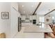 Modern kitchen with stainless steel appliances, white cabinetry, and a large center island at 5428 Title Row Dr, Bradenton, FL 34210