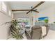 Bright living room features vaulted ceilings, exposed beams, and a relaxing atmosphere at 5428 Title Row Dr, Bradenton, FL 34210