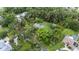 Aerial view of property lines highlighting a lush backyard with a swimming pool at 5430 Richardson Rd, Sarasota, FL 34232
