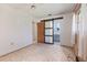 Bright bedroom featuring a barn door leading to an en-suite bathroom at 5430 Richardson Rd, Sarasota, FL 34232