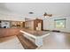 Open living space with exposed brick, dining area and lots of natural light, perfect for entertaining at 5430 Richardson Rd, Sarasota, FL 34232