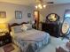 Comfortable bedroom with traditional furnishings and soft, neutral colors at 620 Camellia Ave, Ellenton, FL 34222
