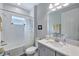 Bathroom featuring tub and shower combination, subway tile, and vanity with countertop at 6219 Golden Nettle Dr, Apollo Beach, FL 33572