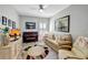 Inviting living room featuring wood-look flooring, tan sofa and a comfortable seating area at 6219 Golden Nettle Dr, Apollo Beach, FL 33572