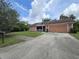 Charming single-Gathering home with a well-maintained lawn and a two-car garage at 6305 Bikini Rd, Sarasota, FL 34241